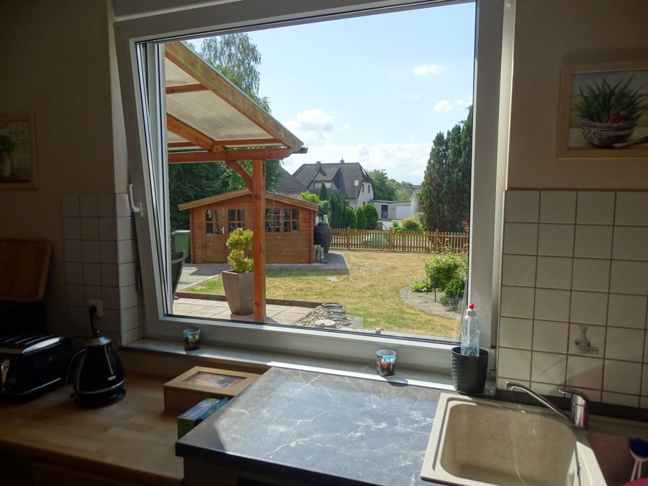 Familien aufgepasst ! Modernes Endreihenhaus mit viel Platz in bester Lage von Munster.