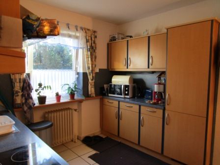 End terraced house in Norderstedt with private garden, double garage and guest apartment